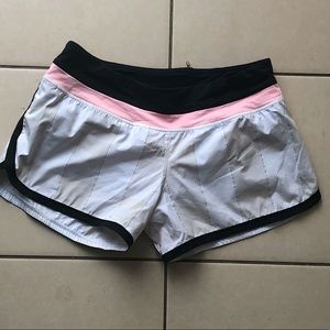 Lululemon speed running shorts. Pink, black with built in underwear.